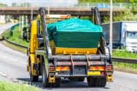 skip lorry truck on uk motorway in fast motion